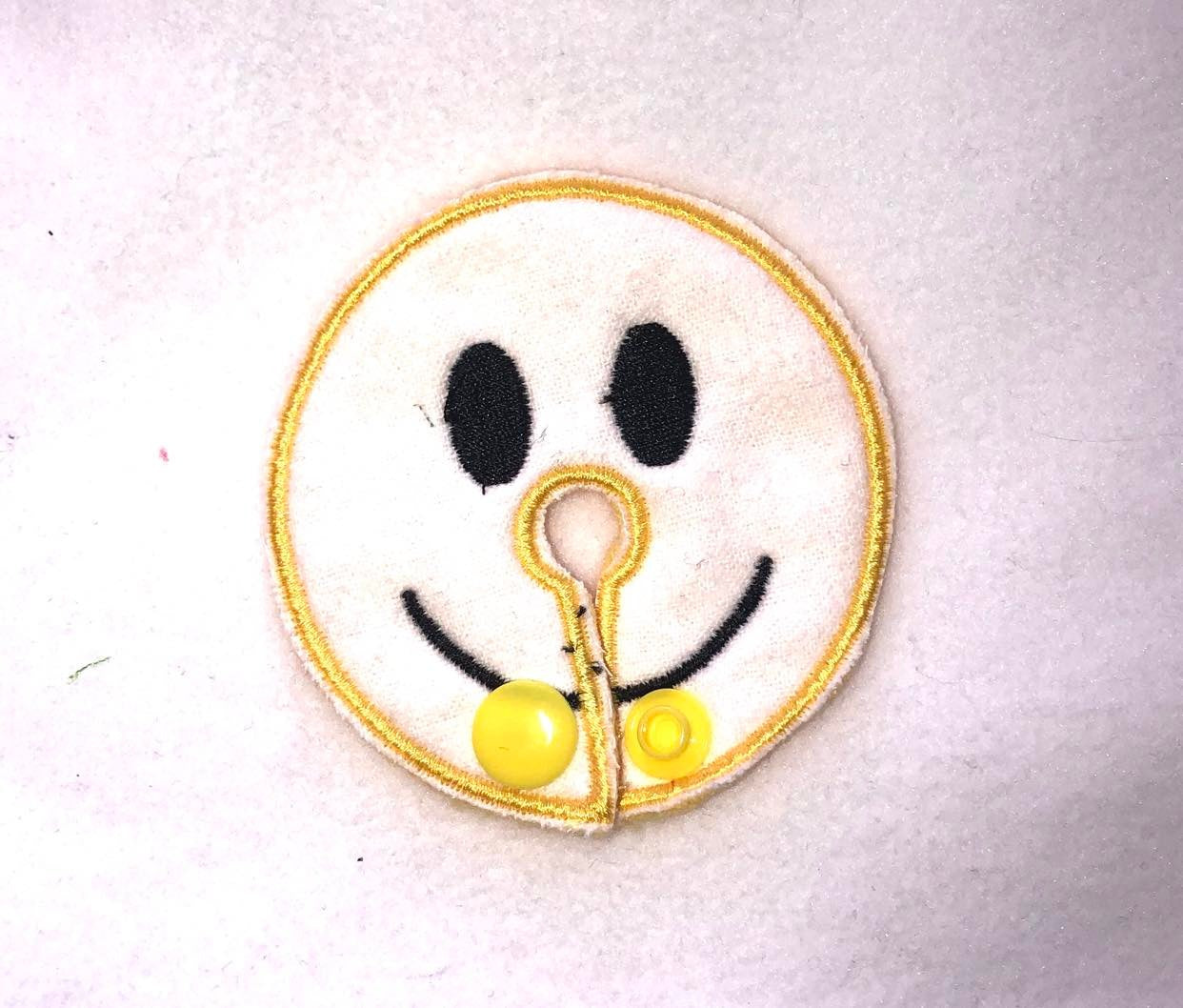 Smiley face gtube pad